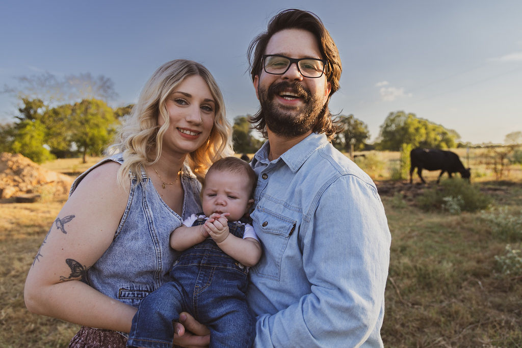 Happy family portrait in the late afternoon light